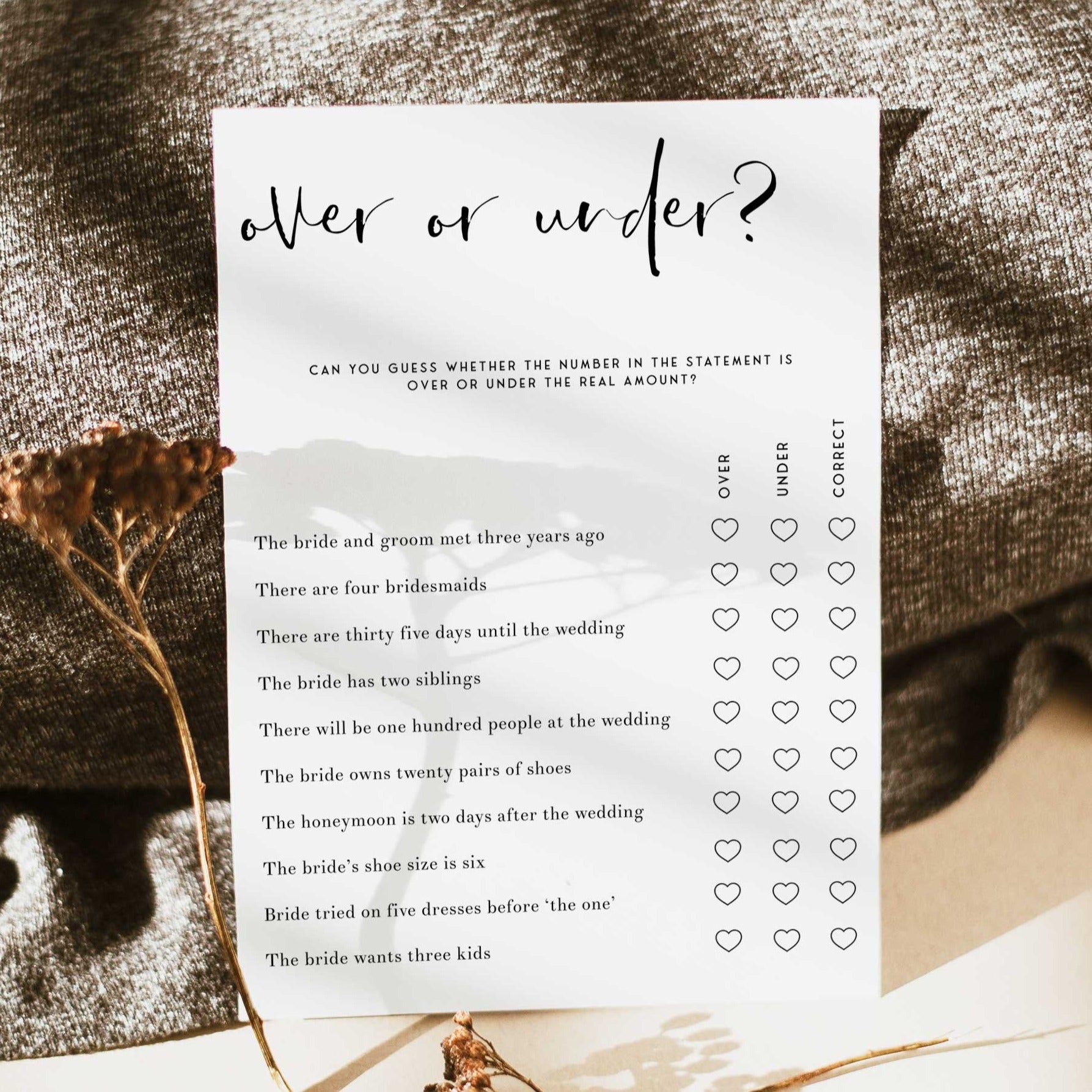 Fully editable and printable bridal shower over or under game with a modern minimalist design. Perfect for a modern simple bridal shower themed party
