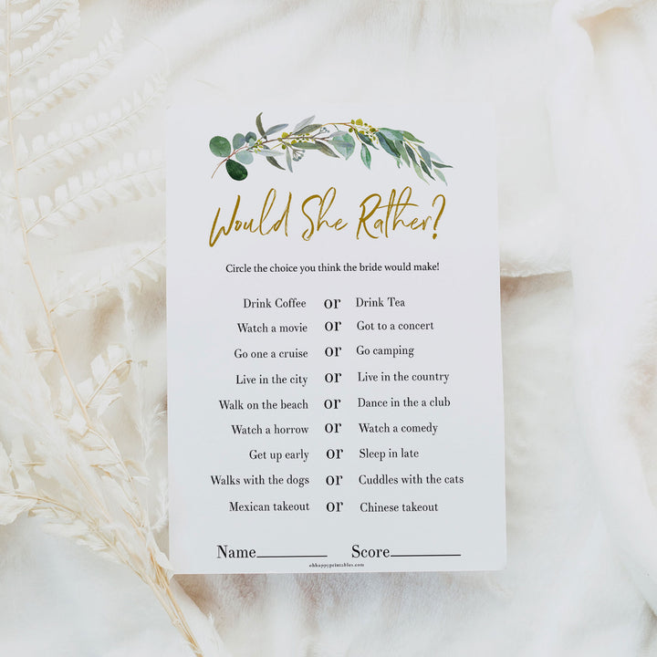 Bridal Shower game Would She Rather, with a gold and eucalyptus greenery design